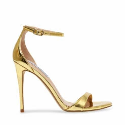 SteveMadden KASSANDRA COGNAC PATENT 15 SteveMadden KASSANDRA COGNAC PATENT -Steve Madden | Official Store STEVEMADDEN SANDALS KASSANDRA GOLD SIDE 2